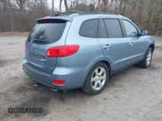 ✅ 2009 Hyundai Santa Fe SE • VIN: 5NMSH13E49H331045 • Lot: 41846484. Listed on IAAI with 170,579 mi. Free auction sales archive from the USA and detailed vehicle history report at DreamBid. Image 4.