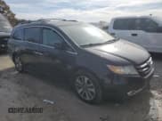 ✅ 2014 Honda Odyssey Touring • VIN: 5FNRL5H99EB036129 • Lot: 92671075. Listed on Copart with Not provided. Free auction sales archive from the USA and detailed vehicle history report at DreamBid. Image 4.