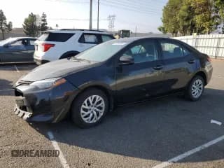 ✅ 2019 Toyota Corolla L • VIN: 5YFBURHE9KP911874 • Lot: 82703205. Listed on Copart with 66,728 mi. Free auction sales archive from the USA and detailed vehicle history report at DreamBid. Image 1.