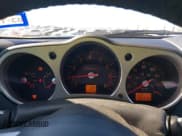 ✅ 2003 Nissan 350Z Touring • VIN: JN1AZ34D73T114026 • Лот: 42841609. Опубликован ранее на IAAI с пробегом 128 111 миль. Бесплатный доступ к архиву аукционных продаж из США и подробный отчёт об истории автомобиля на DreamBid. Изображение 7.