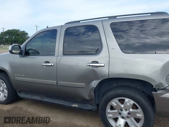✅ 2007 Chevrolet Tahoe LS • VIN: 1GNFC13C87R399010 • Lot: 42681863. Listed on IAAI with 211,825 mi. Free auction sales archive from the USA and detailed vehicle history report at DreamBid. Image 14.
