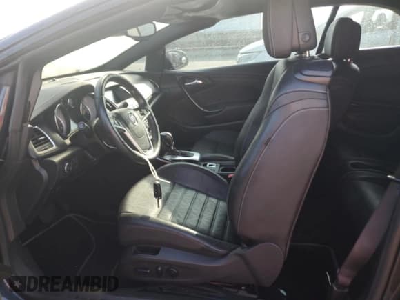 ✅ 2016 Buick Cascada Premium • VIN: W04WT3N55GG040464 • Lot: 73645414. Wystawiony na Copart z przebiegiem Nie podano. Bezpłatny archiwum sprzedaży aukcyjnych z USA i szczegółowy raport historii pojazdu na DreamBid. Zdjęcie 7.