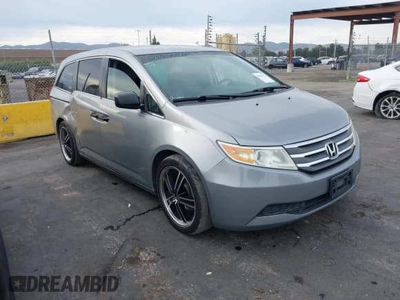 ✅ 2013 Honda Odyssey LX • VIN: 5FNRL5H22DB058782 • Lot: 43651712. Listed on IAAI with 132,798 mi. Free auction sales archive from the USA and detailed vehicle history report at DreamBid. Image 1.