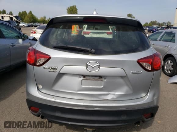 ✅ 2016 Mazda CX-5 Sport • VIN: JM3KE4BY2G0618930 • Lot: 54608855. Listed on Copart with 126,453 mi. Free auction sales archive from the USA and detailed vehicle history report at DreamBid. Image 6.