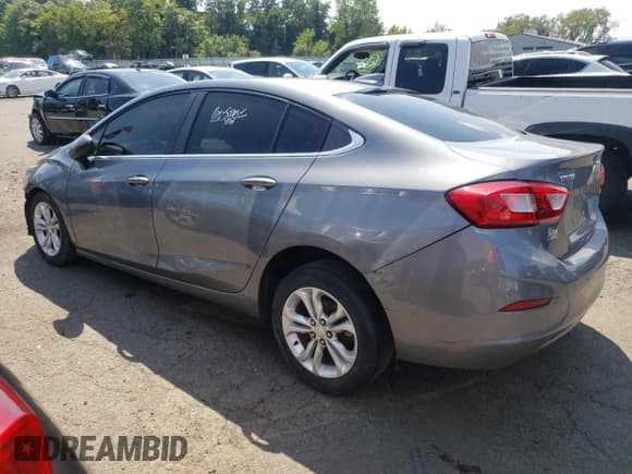 ✅ 2019 Chevrolet Cruze LT • VIN: 1G1BE5SM7K7135468 • Lot: 62115613. Listed on Copart with 87,482 mi. Free auction sales archive from the USA and detailed vehicle history report at DreamBid. Image 2.