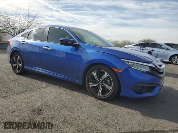 ✅ 2018 Honda Civic Touring • VIN: JHMFC1F9XJX022785 • Лот: 92484625. Опубликован ранее на Copart с пробегом 89 288 миль. Бесплатный доступ к архиву аукционных продаж из США и подробный отчёт об истории автомобиля на DreamBid. Изображение 4.