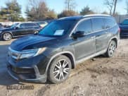 ✅ 2019 Honda Pilot Touring 7-Passenger • VIN: 5FNYF6H65KB061796 • Lot: 41650857. Wystawiony na IAAI z przebiegiem 122 417 mil. Bezpłatny archiwum sprzedaży aukcyjnych z USA i szczegółowy raport historii pojazdu na DreamBid. Zdjęcie 18.