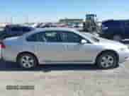 2013 Chevrolet Impala LS z VIN 2G1WF5E35D1265220, wystawiony jako IAAI lot #42559869 z przebiegiem 124 046 mil mil oraz . Historia ofert i sprzedaży dostępna na DreamBid. Obrazek 13.