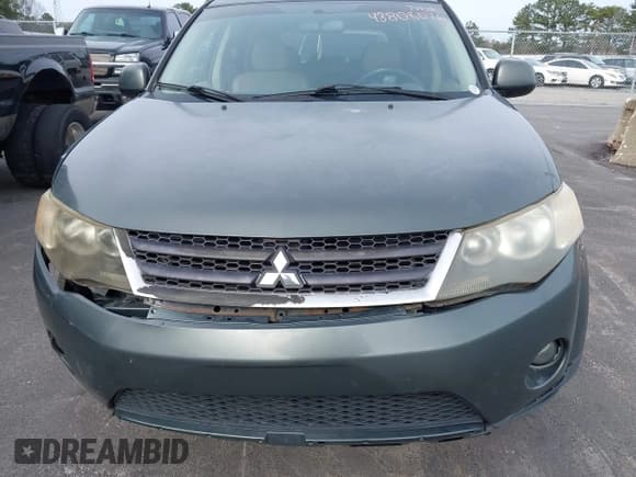 ✅ 2008 Mitsubishi Outlander SE • VIN: JA4LS31W58Z010939 • Lot: 43808076. Listed on IAAI with 220,661 mi. Free auction sales archive from the USA and detailed vehicle history report at DreamBid. Image 6.