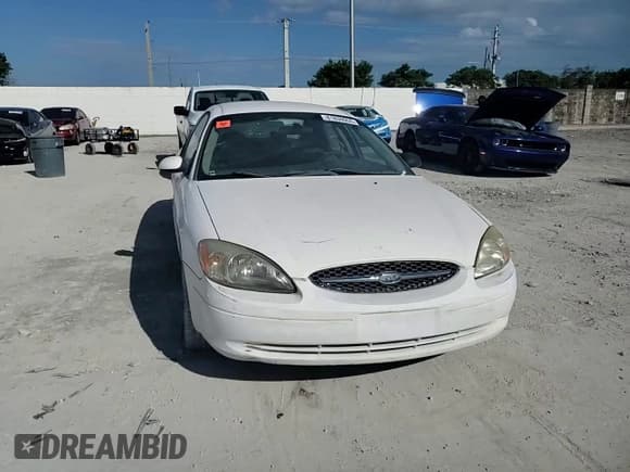 ✅ 2003 Ford Taurus SE Standard • VIN: 1FAFP53U23A194519 • Lot: 81839955. Wystawiony na Copart z przebiegiem 116 752 mil. Bezpłatny archiwum sprzedaży aukcyjnych z USA i szczegółowy raport historii pojazdu na DreamBid. Zdjęcie 13.