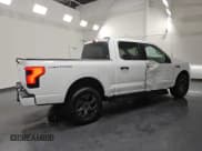 ✅ 2024 Ford F-150 Lightning XLT • VIN: 1FTVW3LKXRWG06404 • Lot: 84980215. Listed on Copart with 14,760 mi. Free auction sales archive from the USA and detailed vehicle history report at DreamBid. Image 3.