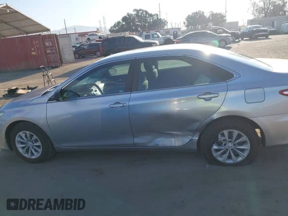 2016 Toyota Camry LE with VIN 4T4BF1FK2GR528875, listed as a IAAI auction lot 43236649 with 26,927 mi miles and . Bid and sale history available at DreamBid. Image 14.