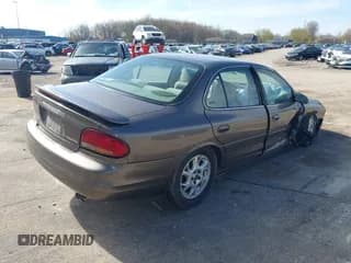 ✅ 2000 Oldsmobile Intrigue GX • VIN: 1G3WH52H0YF280823 • Lot: 42199925. Listed on IAAI with 102,427 mi. Free auction sales archive from the USA and detailed vehicle history report at DreamBid. Image 4.