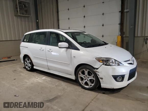 ✅ 2009 Mazda 5 Touring • VIN: JM1CR29L090338085 • Lot: 71718135. Listed on Copart with 163,773 mi. Free auction sales archive from the USA and detailed vehicle history report at DreamBid. Image 4.