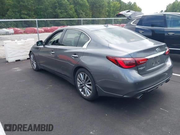 ✅ 2023 Infiniti Q50 Luxe • VIN: JN1EV7BP4PM510402 • Lot: 43047309. Listed on IAAI with 40,316 mi. Free auction sales archive from the USA and detailed vehicle history report at DreamBid. Image 3.