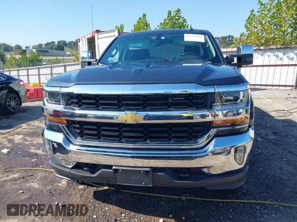 2018 Chevrolet Silverado 1500 LT z VIN 3GCUKREC4JG292008, wystawiony jako IAAI lot #43370209 z przebiegiem 96 545 mil mil oraz . Historia ofert i sprzedaży dostępna na DreamBid. Obrazek 12.