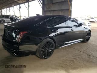 ✅ 2022 Cadillac CT5-V • VIN: 1G6DR5RW7N0129214 • Lot: 84247854. Listed on Copart with 21,834 mi. Free auction sales archive from the USA and detailed vehicle history report at DreamBid. Image 3.