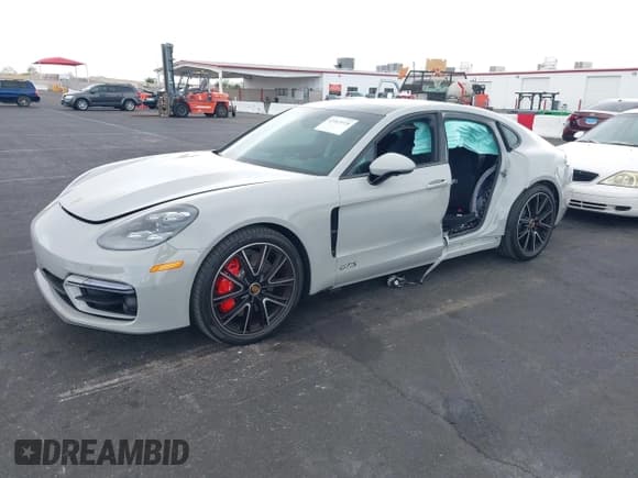 ✅ 2023 Porsche Panamera GTS • VIN: WP0AG2A71PL135536 • Lot: 42065928. Listed on IAAI with 6,818 mi. Free auction sales archive from the USA and detailed vehicle history report at DreamBid. Image 2.