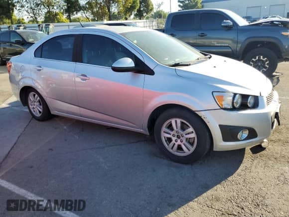 2014 Chevrolet Sonic LT with VIN 1G1JC5SHXE4172203, listed as a Copart auction lot 82361315 with 116,215 mi miles and Salvage title. Bid and sale history available at DreamBid. Image 4.