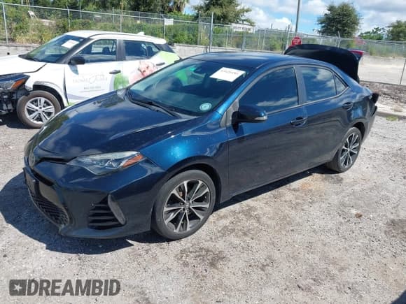 ✅ 2018 Toyota Corolla LE • VIN: 5YFBURHE3JP838905 • Lot: 43426181. Wystawiony na IAAI z przebiegiem 186 341 mil. Bezpłatny archiwum sprzedaży aukcyjnych z USA i szczegółowy raport historii pojazdu na DreamBid. Zdjęcie 2.