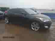 2017 Hyundai Veloster z VIN KMHTC6AD1HU313051, wystawiony jako Copart lot #82075395 z przebiegiem 69 415 mil mil oraz Szkoda całkowita • Salvage title. Historia ofert i sprzedaży dostępna na DreamBid. Obrazek 4.