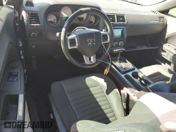 2013 Dodge Challenger SXT z VIN 2C3CDYAG5DH649553, wystawiony jako Copart lot #90937935 z przebiegiem 141 237 mil mil oraz Czysty tytuł • Clean title. Historia ofert i sprzedaży dostępna na DreamBid. Obrazek 8.