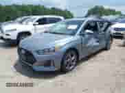 2019 Hyundai Veloster Premium with VIN KMHTG6AF5KU017950, listed as a IAAI auction lot 42611554 with 105,396 mi miles and . Bid and sale history available at DreamBid. Image 2.