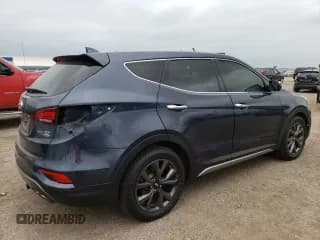 ✅ 2017 Hyundai Santa Fe Ultimate • VIN: 5XYZWDLA1HG473090 • Лот: 65589344. Опубликован ранее на Copart с пробегом 88 367 миль. Бесплатный доступ к архиву аукционных продаж из США и подробный отчёт об истории автомобиля на DreamBid. Изображение 3.