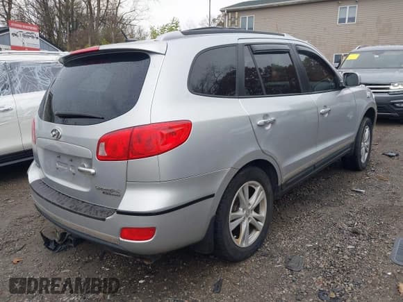 ✅ 2009 Hyundai Santa Fe SE • VIN: 5NMSH73E39H279698 • Lot: 43627061. Listed on IAAI with 185,779 mi. Free auction sales archive from the USA and detailed vehicle history report at DreamBid. Image 4.