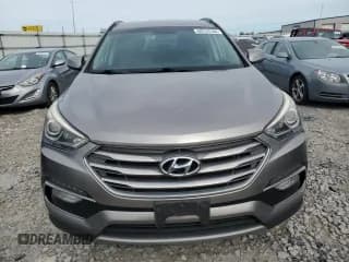 ✅ 2017 Hyundai Santa Fe 2.4L • VIN: 5XYZU3LBXHG445703 • Лот: 69723184. Опубликован ранее на Copart с пробегом 110 282 миль. Бесплатный доступ к архиву аукционных продаж из США и подробный отчёт об истории автомобиля на DreamBid. Изображение 5.