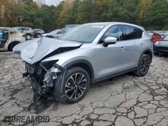 ✅ 2022 Mazda CX-5 S Premium Plus • VIN: JM3KFBEM5N1572799 • Лот: 90689595. Опубликован ранее на Copart с пробегом 30 977 миль. Бесплатный доступ к архиву аукционных продаж из США и подробный отчёт об истории автомобиля на DreamBid. Изображение 1.