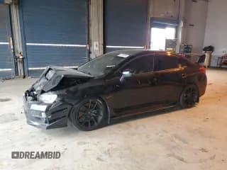 ✅ 2017 Subaru WRX STI • VIN: JF1VA2V69H9819999 • Lot: 82733285. Listed on Copart with 95,593 mi. Free auction sales archive from the USA and detailed vehicle history report at DreamBid. Image 1.