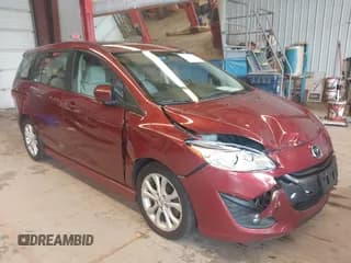 ✅ 2012 Mazda 5 Touring • VIN: JM1CW2CL3C0136544 • Lot: 42696240. Listed on IAAI with 77,400 mi. Free auction sales archive from the USA and detailed vehicle history report at DreamBid. Image 1.