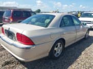 ✅ 2000 Lincoln LS • VIN: 1LNHM87A1YY834775 • Лот: 42688854. Опубликован ранее на IAAI с пробегом 245 916 миль. Бесплатный доступ к архиву аукционных продаж из США и подробный отчёт об истории автомобиля на DreamBid. Изображение 4.