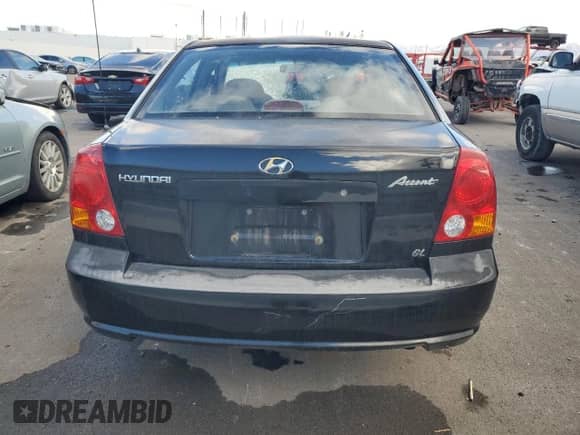 2003 Hyundai Accent GL with VIN KMHCG45C43U429167, listed as a Copart auction lot 79658124 with 80,926 mi miles and Clean title. Bid and sale history available at DreamBid. Image 6.