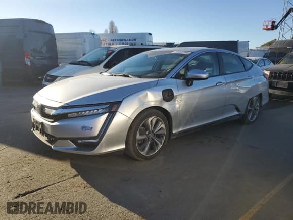 ✅ 2021 Honda Clarity • VIN: JHMZC5F15MC001126 • Lot: 89397385. Listed on Copart with 29,584 mi. Free auction sales archive from the USA and detailed vehicle history report at DreamBid. Image 1.