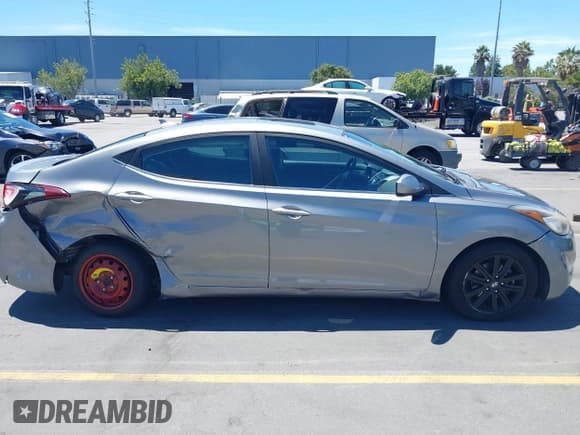 ✅ 2015 Hyundai Elantra SE • VIN: KMHDH4AE4FU344861 • Lot: 42821071. Listed on IAAI with 126,084 mi. Free auction sales archive from the USA and detailed vehicle history report at DreamBid. Image 13.