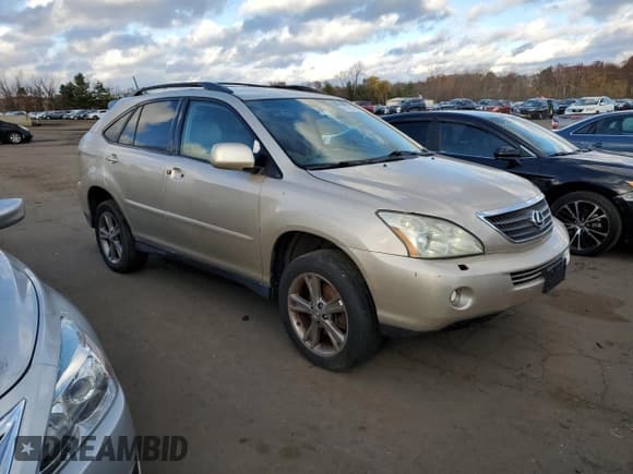 ✅ 2006 Lexus RX 400h • VIN: JTJHW31U860010379 • Лот: 92355135. Опубликован ранее на Copart с пробегом Не указан. Бесплатный доступ к архиву аукционных продаж из США и подробный отчёт об истории автомобиля на DreamBid. Изображение 4.