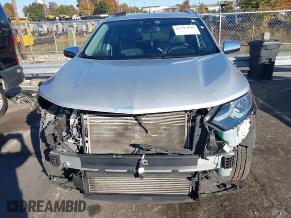 ✅ 2018 Chevrolet Equinox Premier • VIN: 2GNAXVEV6J6312308 • Лот: 43537199. Опубликован ранее на IAAI с пробегом 169 894 миль. Бесплатный доступ к архиву аукционных продаж из США и подробный отчёт об истории автомобиля на DreamBid. Изображение 12.