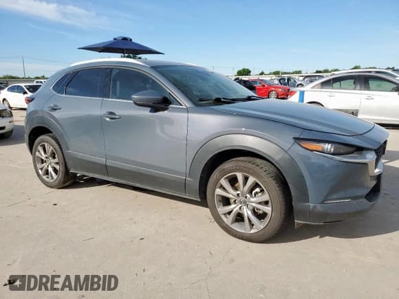 ✅ 2020 Mazda CX-30 Premium • VIN: 3MVDMAEMXLM125319 • Lot: 57896985. Wystawiony na Copart z przebiegiem 117 692 mil. Bezpłatny archiwum sprzedaży aukcyjnych z USA i szczegółowy raport historii pojazdu na DreamBid. Zdjęcie 4.