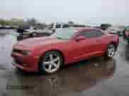 2015 Chevrolet Camaro LT z VIN 2G1FD1E36F9275676, wystawiony jako Copart lot #90057235 z przebiegiem 142 163 mil mil oraz Szkoda całkowita • Salvage title. Historia ofert i sprzedaży dostępna na DreamBid. Obrazek 1.
