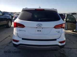 ✅ 2017 Hyundai Santa Fe 2.4L • VIN: 5XYZUDLB4HG484566 • Лот: 44018174. Опубликован ранее на Copart с пробегом 86 979 миль. Бесплатный доступ к архиву аукционных продаж из США и подробный отчёт об истории автомобиля на DreamBid. Изображение 6.