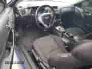 2010 Hyundai Genesis Coupe Premium z VIN KMHHT6KD7AU035282, wystawiony jako Copart lot #82241804 z przebiegiem 144 354 mil mil oraz Szkoda całkowita • Salvage title. Historia ofert i sprzedaży dostępna na DreamBid. Obrazek 8.