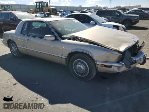 ✅ 1992 Buick Riviera • VIN: 1G4EZ13L3NU404574 • Lot: 74101064. Listed on Copart with 38,281 mi. Free auction sales archive from the USA and detailed vehicle history report at DreamBid. Image 4.