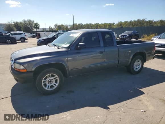 2004 Dodge Dakota z VIN 1D7GL12K64S603027, wystawiony jako Copart lot #75915894 z przebiegiem Nie podano mil oraz Czysty tytuł • Clean title. Historia ofert i sprzedaży dostępna na DreamBid. Obrazek 1.