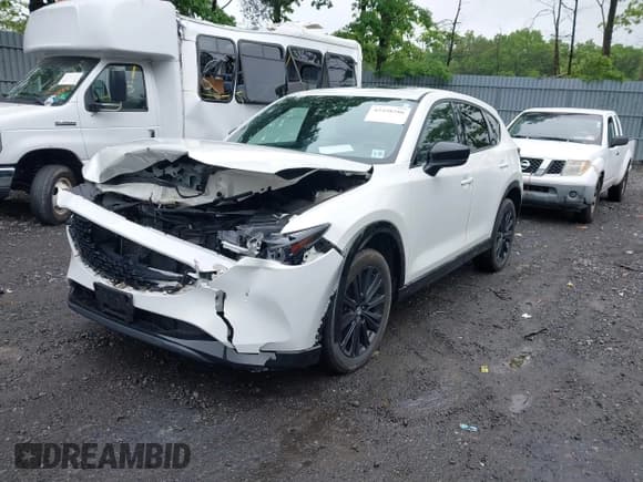 ✅ 2023 Mazda CX-5 2.5 Turbo • VIN: JM3KFBAY0P0153583 • Лот: 42358286. Опубликован ранее на IAAI с пробегом 54 270 миль. Бесплатный доступ к архиву аукционных продаж из США и подробный отчёт об истории автомобиля на DreamBid. Изображение 17.