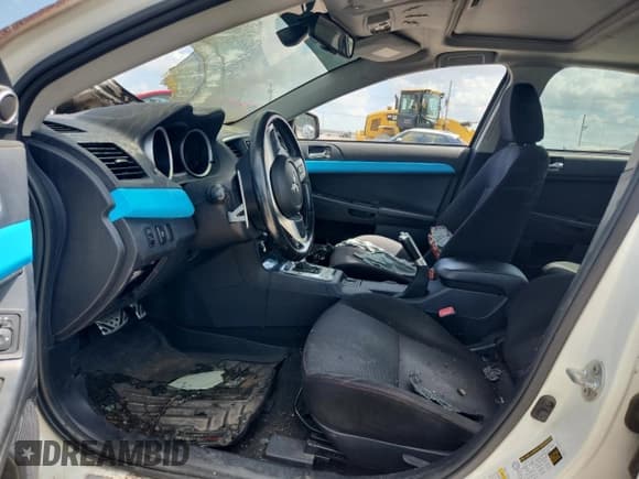 ✅ 2013 Mitsubishi Lancer Evolution MR • VIN: JA32W5FV1DU005325 • Lot: 61864435. Listed on Copart with Not provided. Free auction sales archive from the USA and detailed vehicle history report at DreamBid. Image 7.