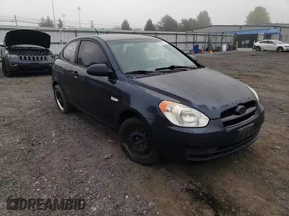 2007 Hyundai Accent GS z VIN KMHCM36C87U004056, wystawiony jako Copart lot #70292314 z przebiegiem 107 760 mil mil oraz Szkoda całkowita • Salvage title. Historia ofert i sprzedaży dostępna na DreamBid. Obrazek 11.
