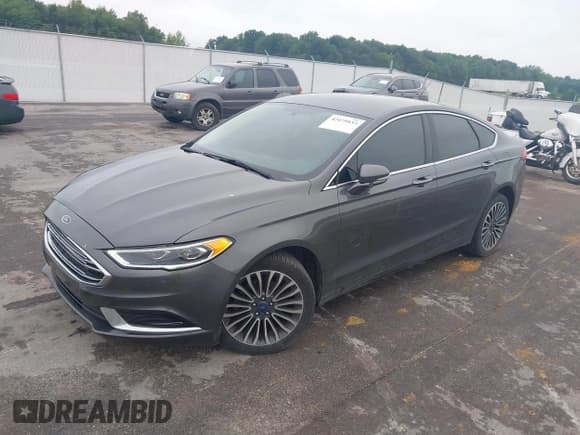✅ 2018 Ford Fusion SE • VIN: 3FA6P0T9XJR135901 • Lot: 42479833. Listed on IAAI with 104,716 mi. Free auction sales archive from the USA and detailed vehicle history report at DreamBid. Image 17.