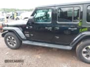 ✅ 2022 Jeep Wrangler Unlimited Sahara • VIN: 1C4HJXEGXNW267813 • Lot: 40331024. Listed on IAAI with 30,905 mi. Free auction sales archive from the USA and detailed vehicle history report at DreamBid. Image 14.